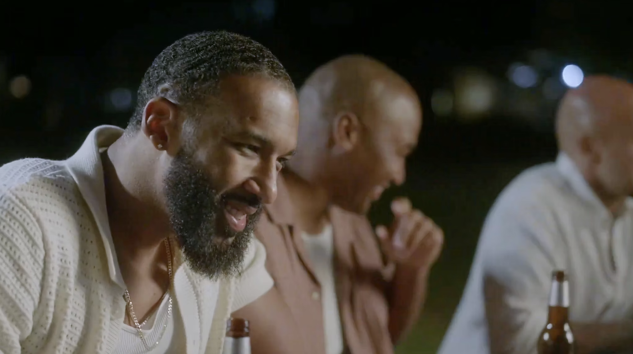 Profile shot of 3 men